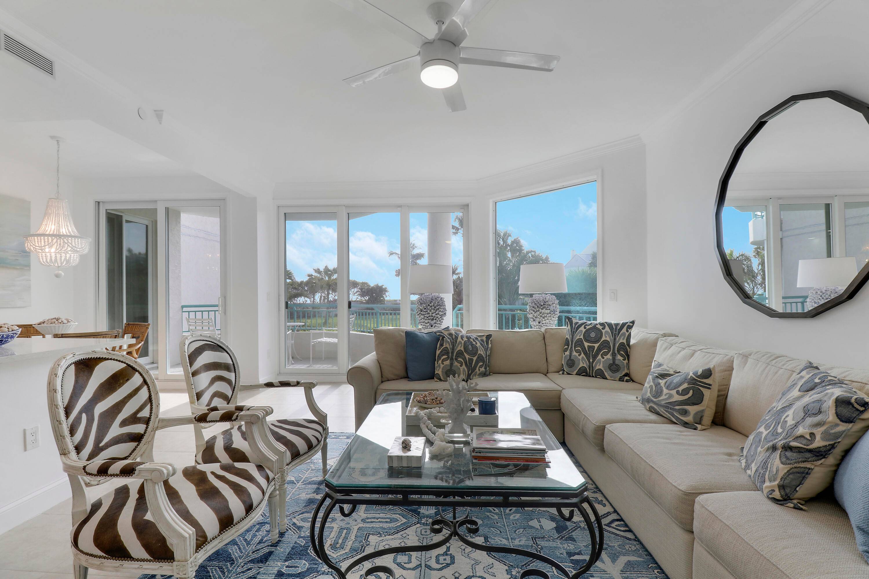Experience luxury living in this exclusive Ocean Club oceanfront condo overlooking Jupiter Beach.