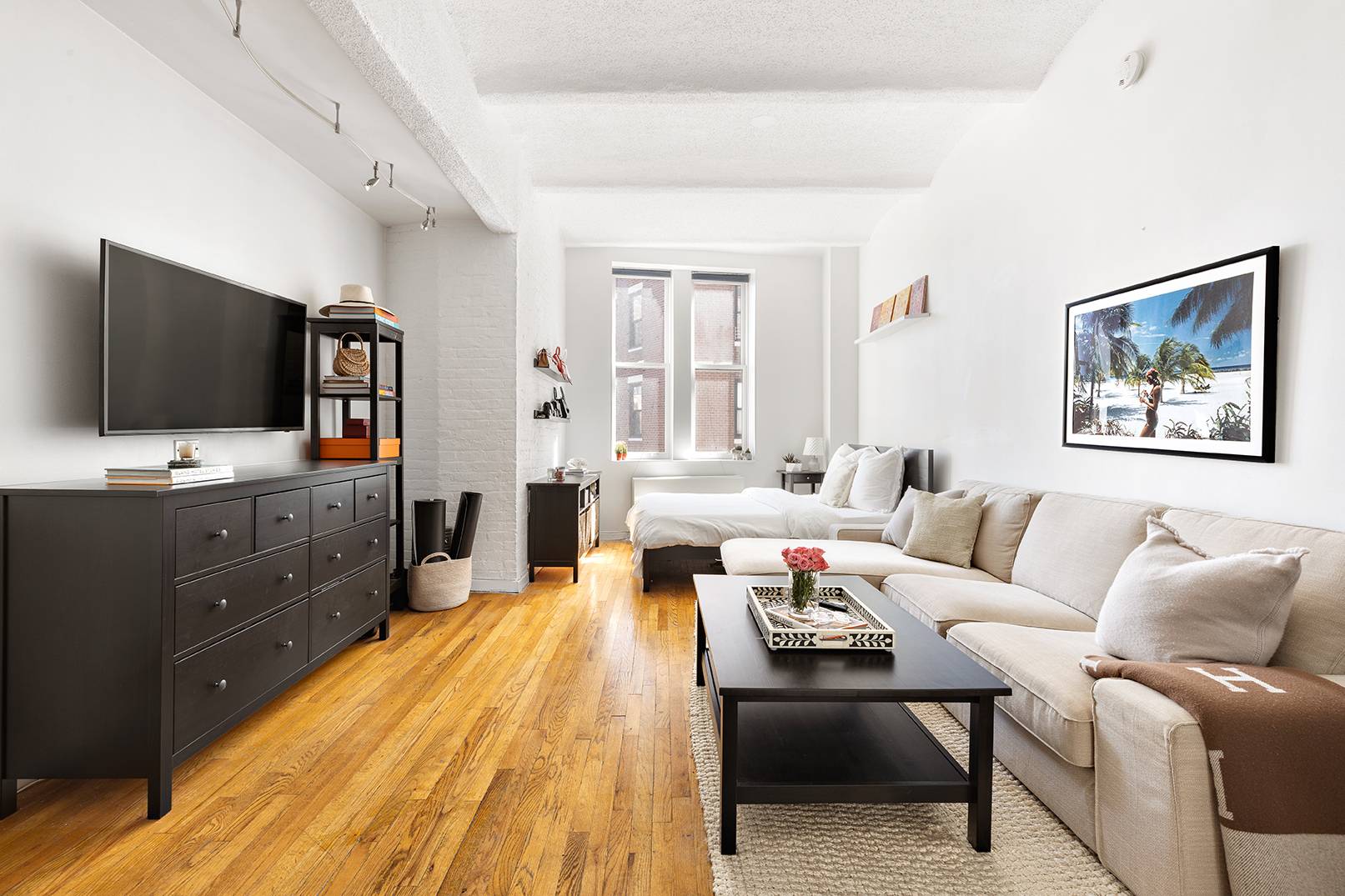 Welcome home to apartment 5G at the Hallanan, a renovated and bright loft like studio in prime West Village.