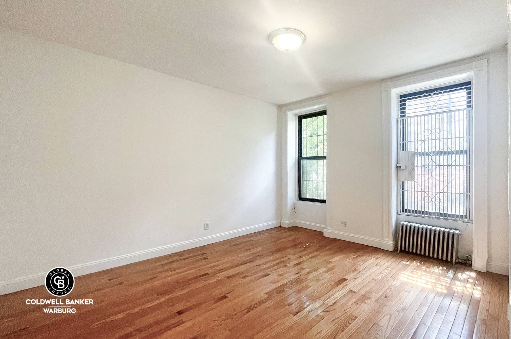 New to the market ! Rare 2 bedroom home on the prettiest treelined West Village Block.