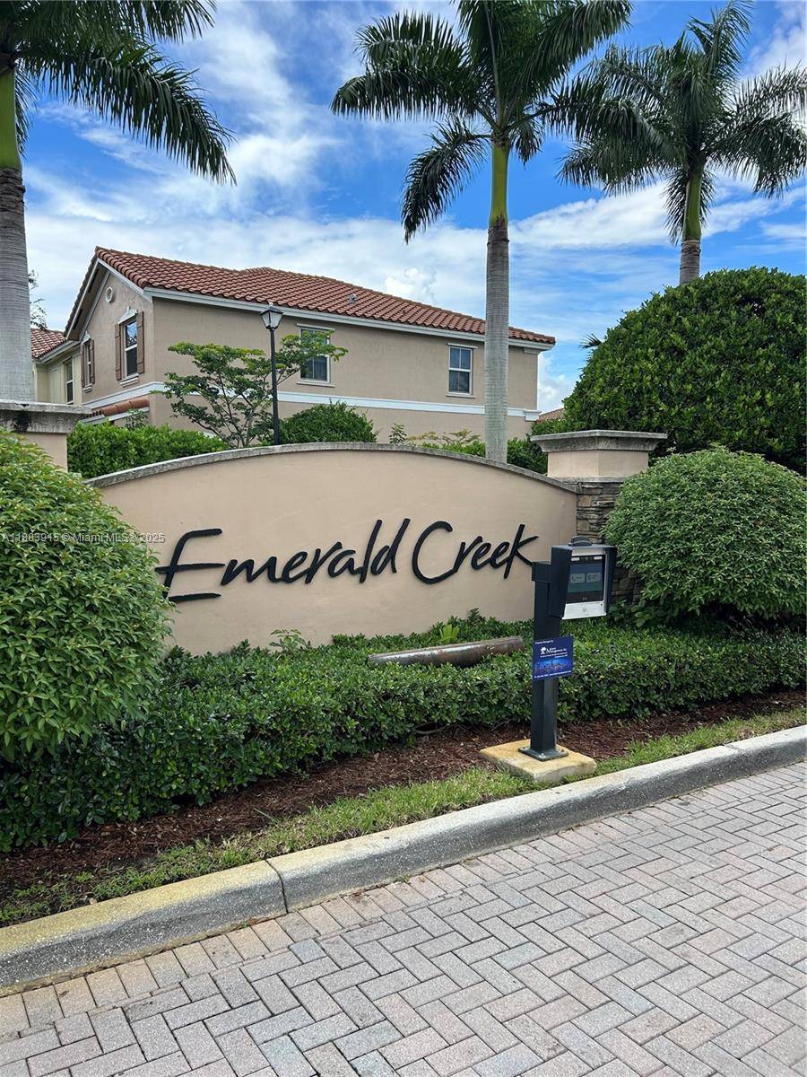 Welcome to your dream home in the gated community of Emerald Creek Townhomes !