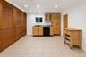 Finished Lower Level space equipped with bonus space, summer kitchen and full bathroom