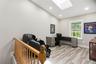 3rd bedroom/office/loft with skylight and new flooring