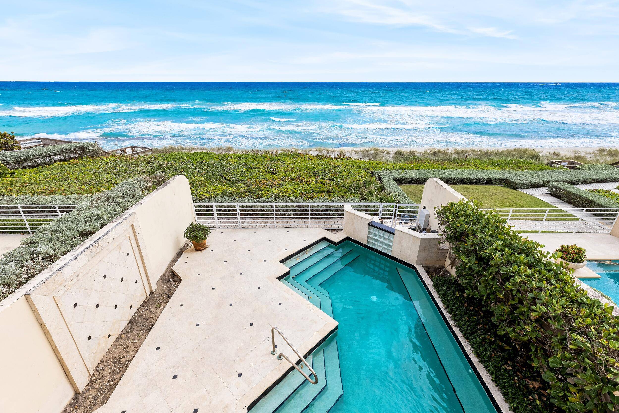 Stunning, and rarely available Direct Oceanfront townhouse with 6, 300 total square feet and 4BR 5.