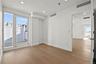 Spare room featuring healthy amount of natural light, light wood-style floors, and recessed lighting