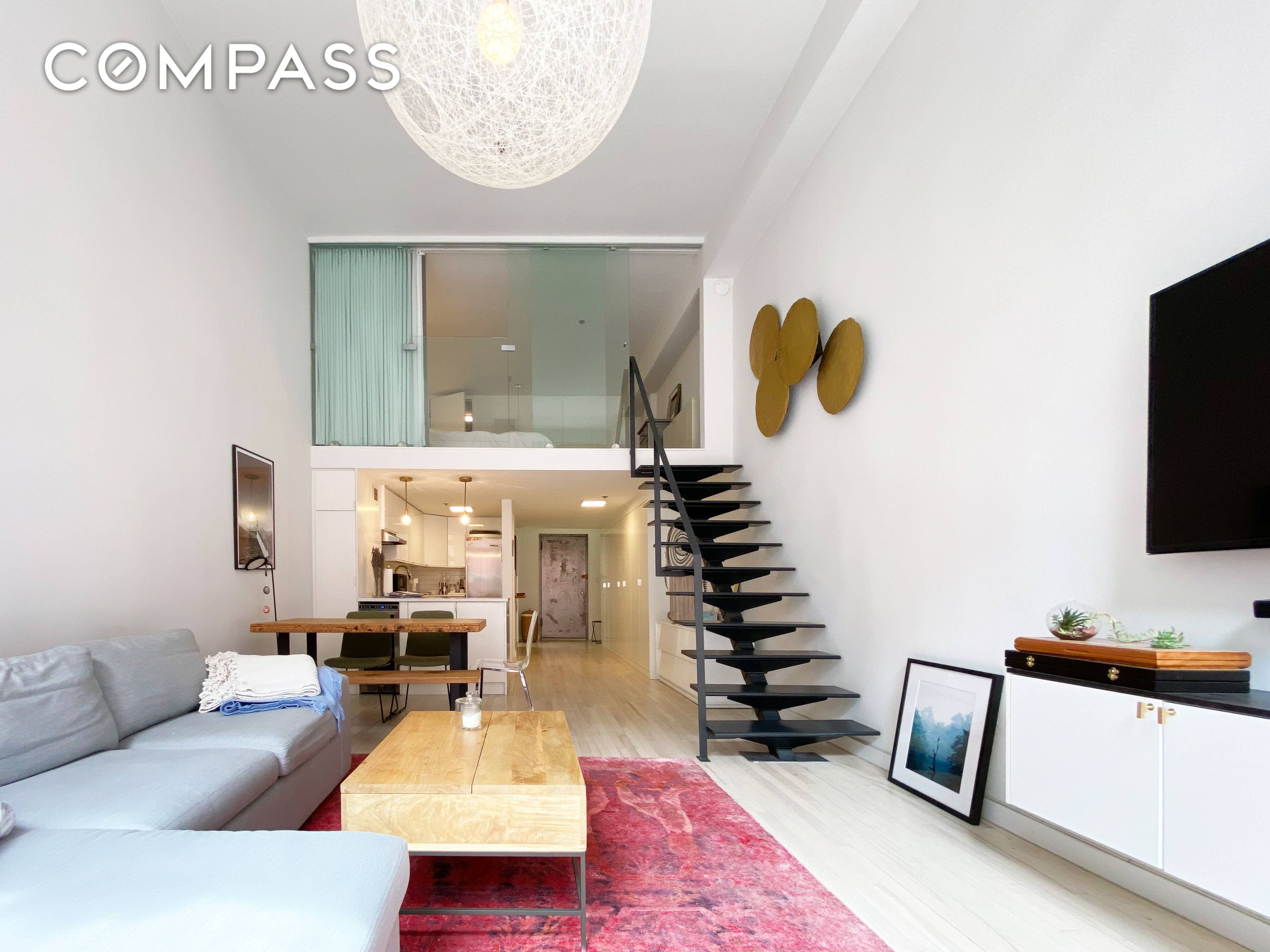 This pre war duplex Loft offers 16 ft ceilings, oversized south facing windows with an abundant amount of sunlight, a tastefully renovated kitchen with a breakfast bar, a floating staircase, ...