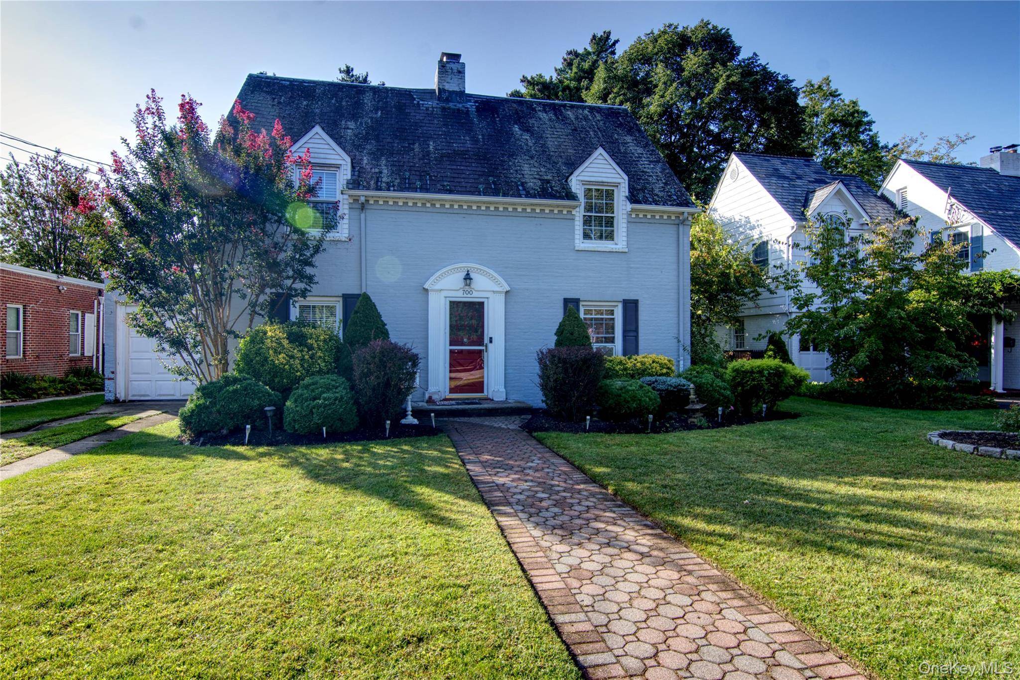 Welcome to this classic Colonial home in the heart of Baldwin that perfectly blends timeless charm with modern comfort.