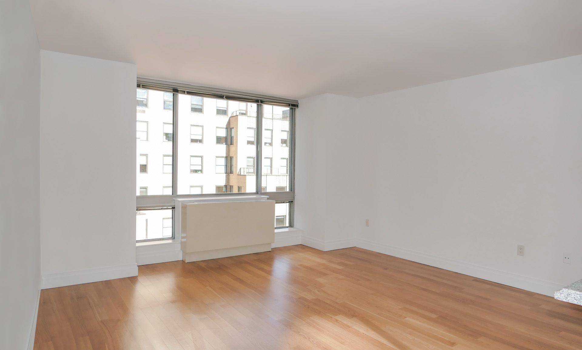 This gorgeous 1BR 1BA has plenty of light with floor to ceiling windows overlooking 44th street.