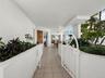 Come on in to your private courtyard, an enticing entrance and a perfect spot for your grill outside the kitchen sliders.