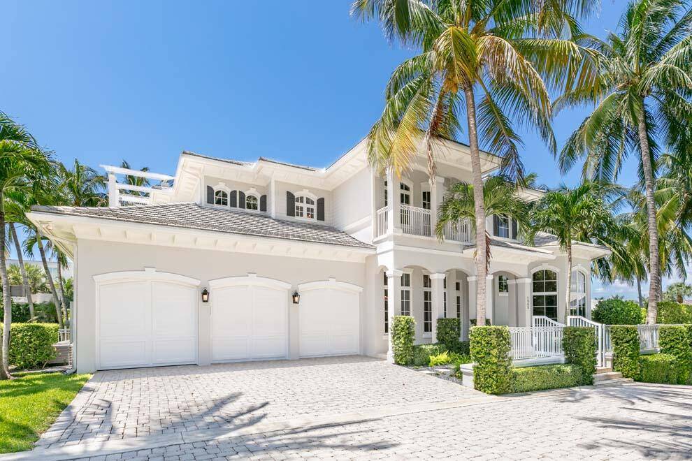 This impressive East Delray Beach coastal estate with deeded beach access is tucked away in a private gated enclave of only three homes.