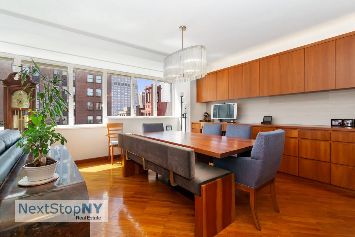 Welcome to this elegant two bedroom and two and half bath duplex doorman condominium located in the Morgan Court in the heart of Murray Hill.