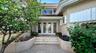 Front door entrance from a private, gated Harbor Section street