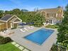 View of Pool, House and Outbuilding