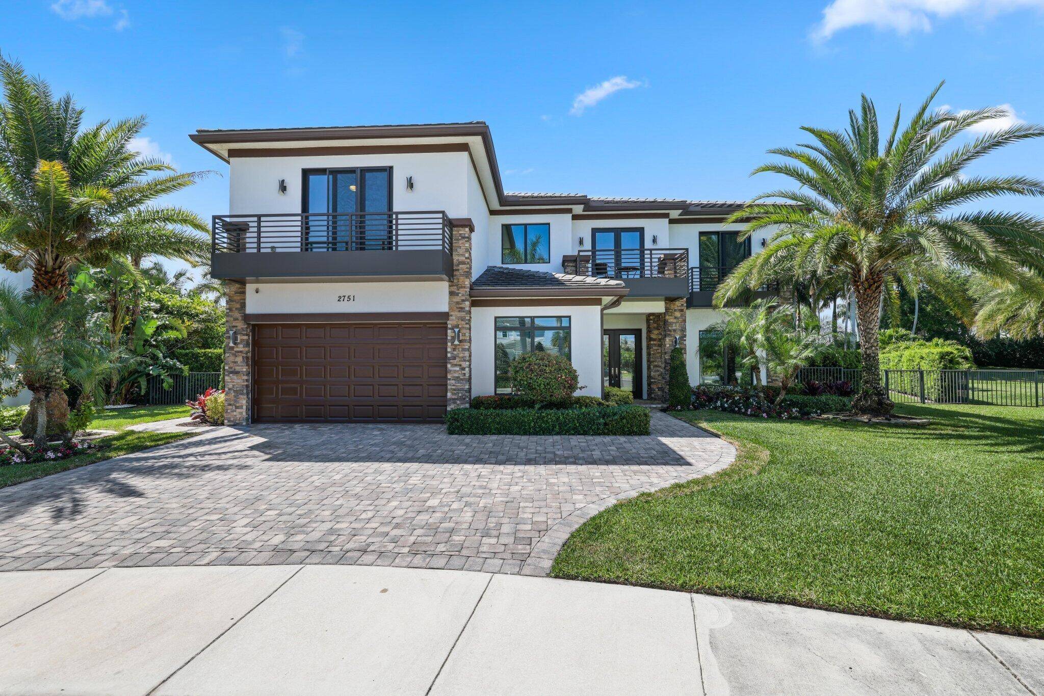 Introducing the Callahan model, a luxurious 6 bedroom home with an office loft, located in the highly sought after gated community of Royal Palm Polo.