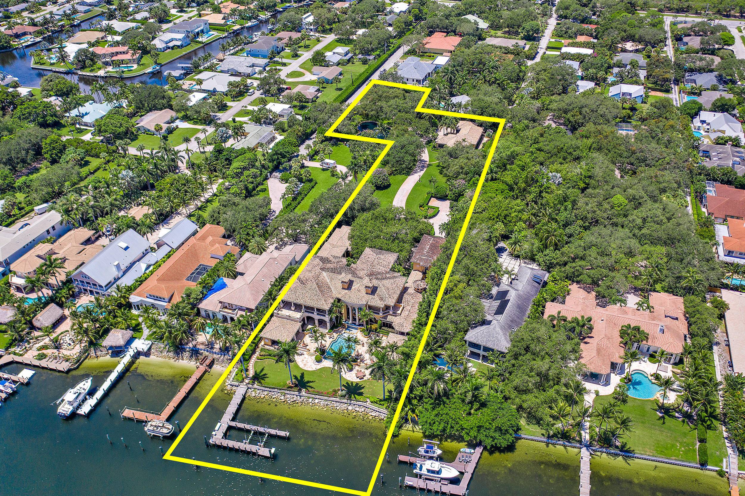 Located directly in the middle of North County this unrivaled gated Intracoastal Estate is situated on an unparalleled 2.
