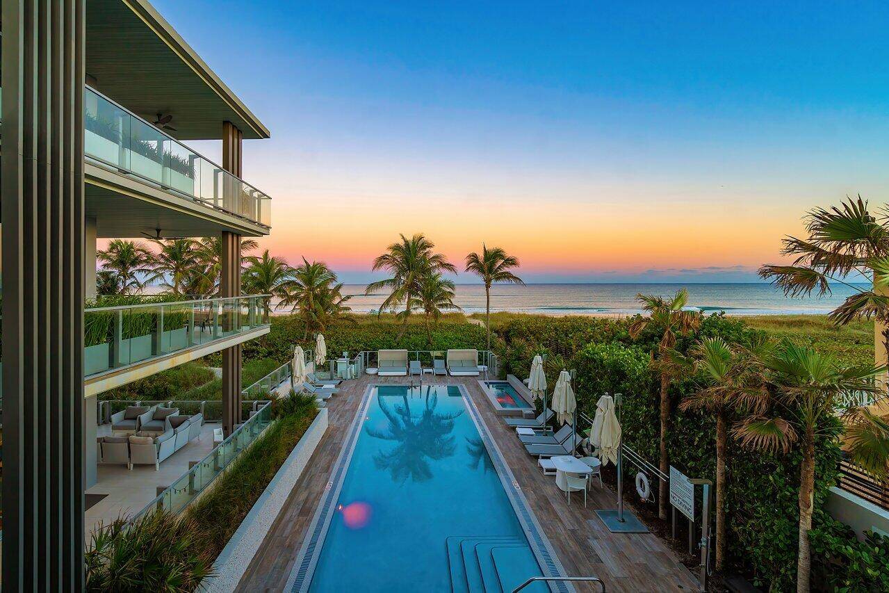 Welcome to a one of a kind Oceanfront Treasure in East Delray, nestled on more than 200 feet of private shoreline.