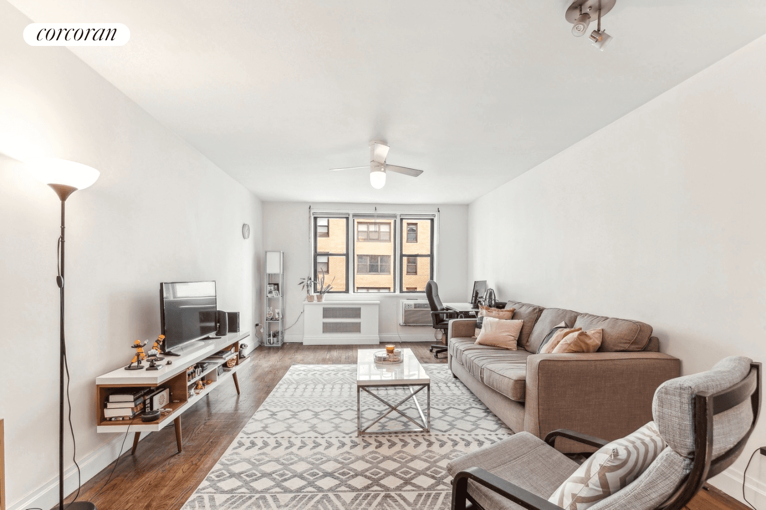 This large 730 sq ft floor thru apartment has a wonderful layout, with triple living room windows facing North onto 28th Street and double windows in the rear bedroom facing ...