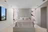 Primary King Bed w/ custom onyx wall decor