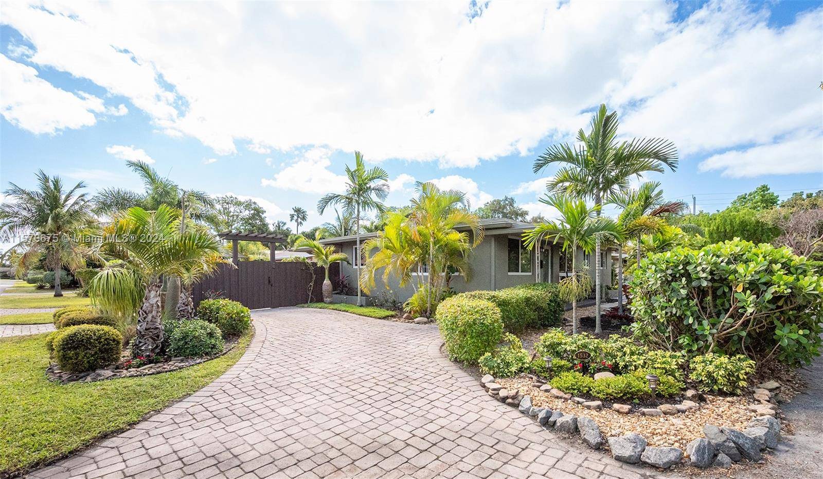 Nestled in Oakland Park's Corals neighborhood, this charming 3 bed, 2 bath residence on a corner lot is in a PRIME LOCATION and epitomizes Florida living.