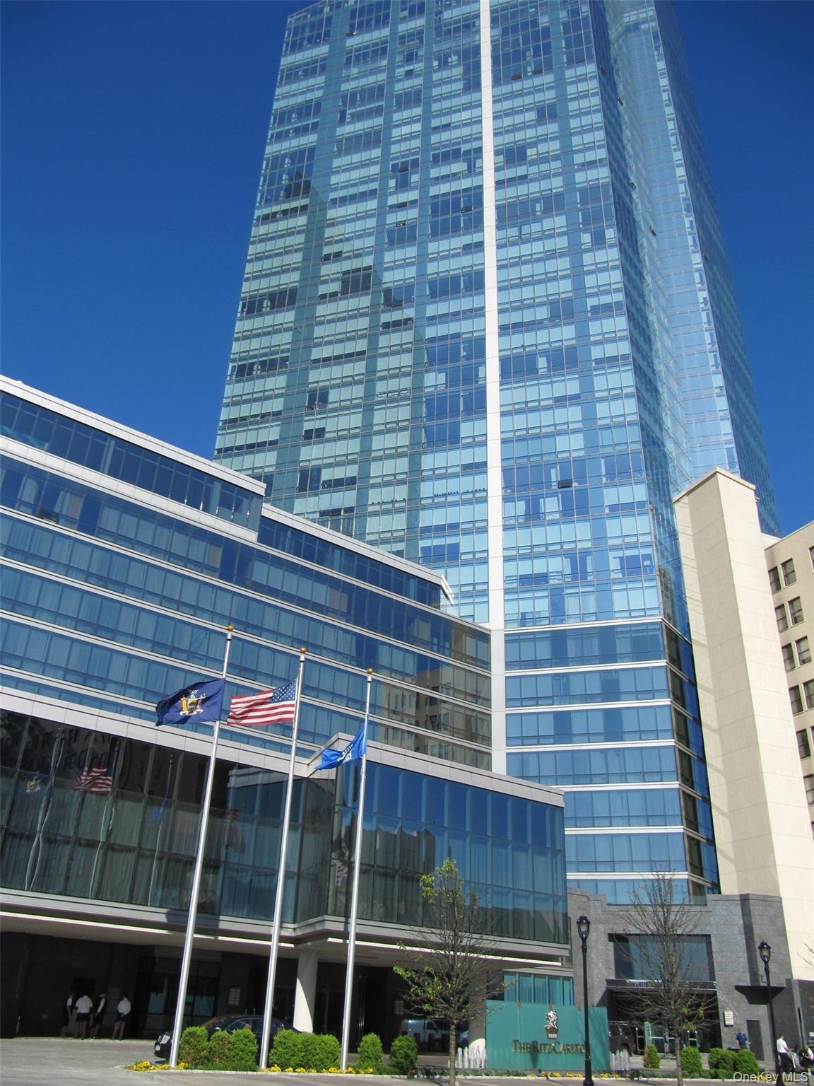 Welcome home to the Ritz Carlton with 24/7 concierge service and valet parking