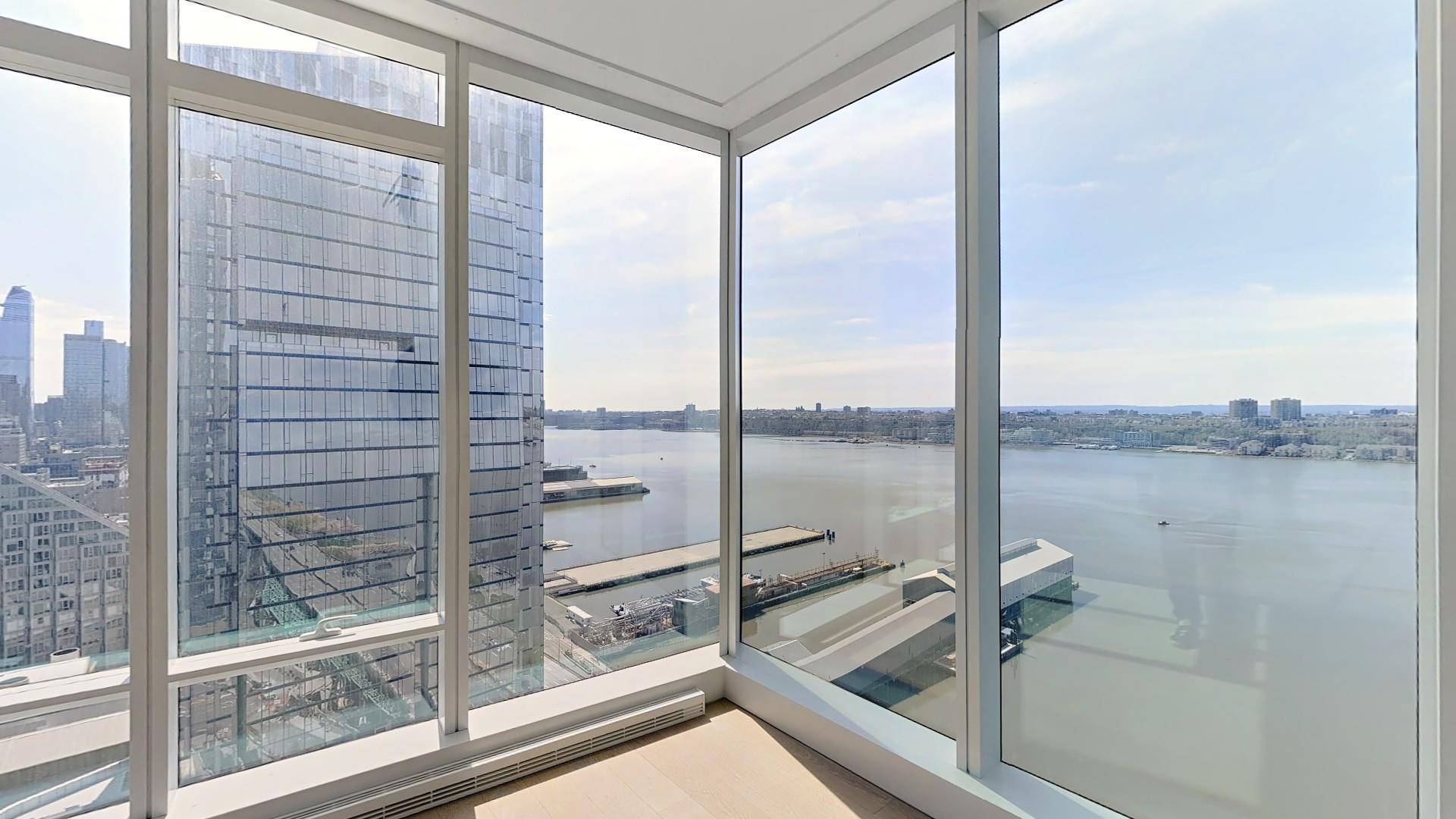 This corner residence enjoys western Hudson River views and southern views across Waterline Square Park through floor to ceiling windows in every room.