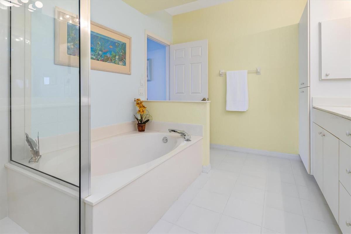 Primary Bath with separate tub, dual vanity and shower.
