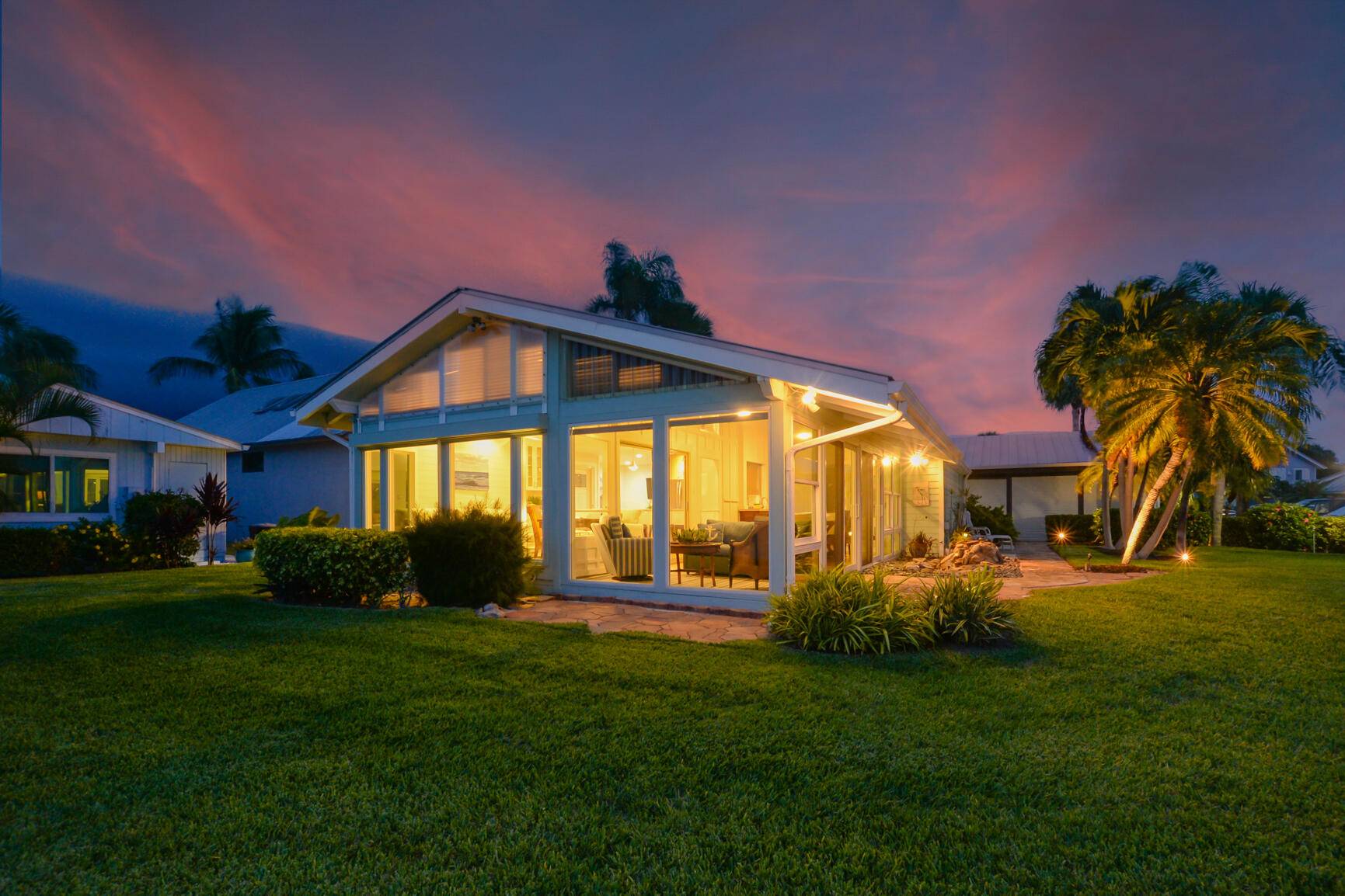 This stunning home comes with spectacular wide water views of the Indian River.