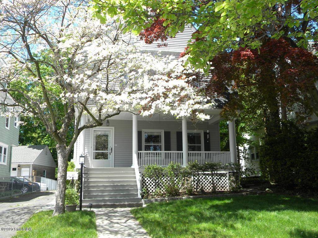 Spacious and Sunny 2 Bedroom 2 Bath Duplex in Central Greenwich on Desirable Tree Lined Street !