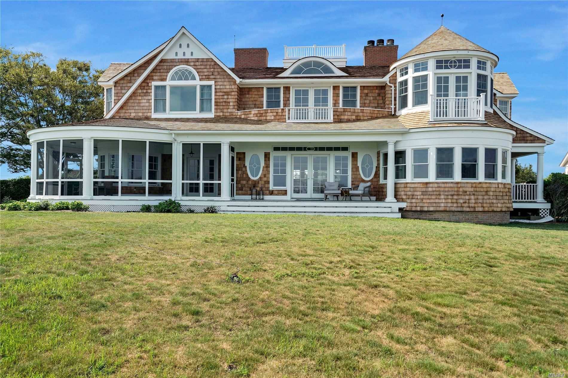 NEW TO MARKET Experience Fall in Quogue on the water in this classic traditional with 222 ft.