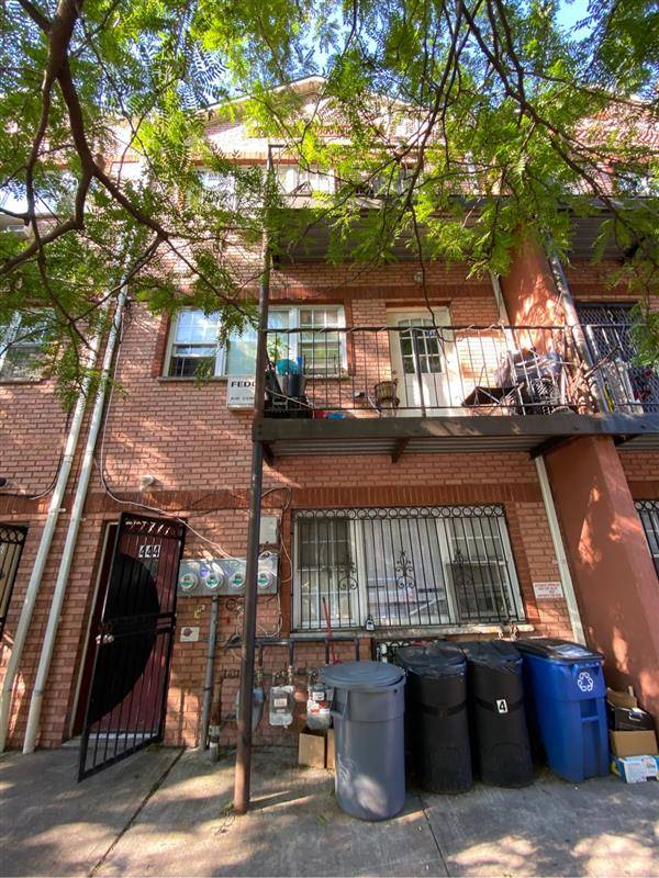 Fantastic OPPORTUNITY TO OWN THIS STUNNING THREE FAMILY HOME IN MOTT HAVEN.