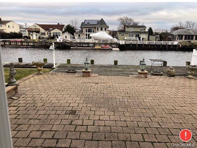 BACK ON THE MARKET ! Lovely starter water front home in Long Island.