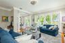 Living room with direct access to breakfast room and kitchen.