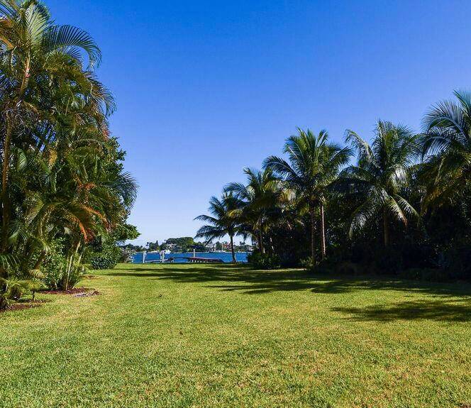 AMAZING INTRACOASTAL WATERFRONT PARCEL WITH DOCK AND BOAT LIFT.
