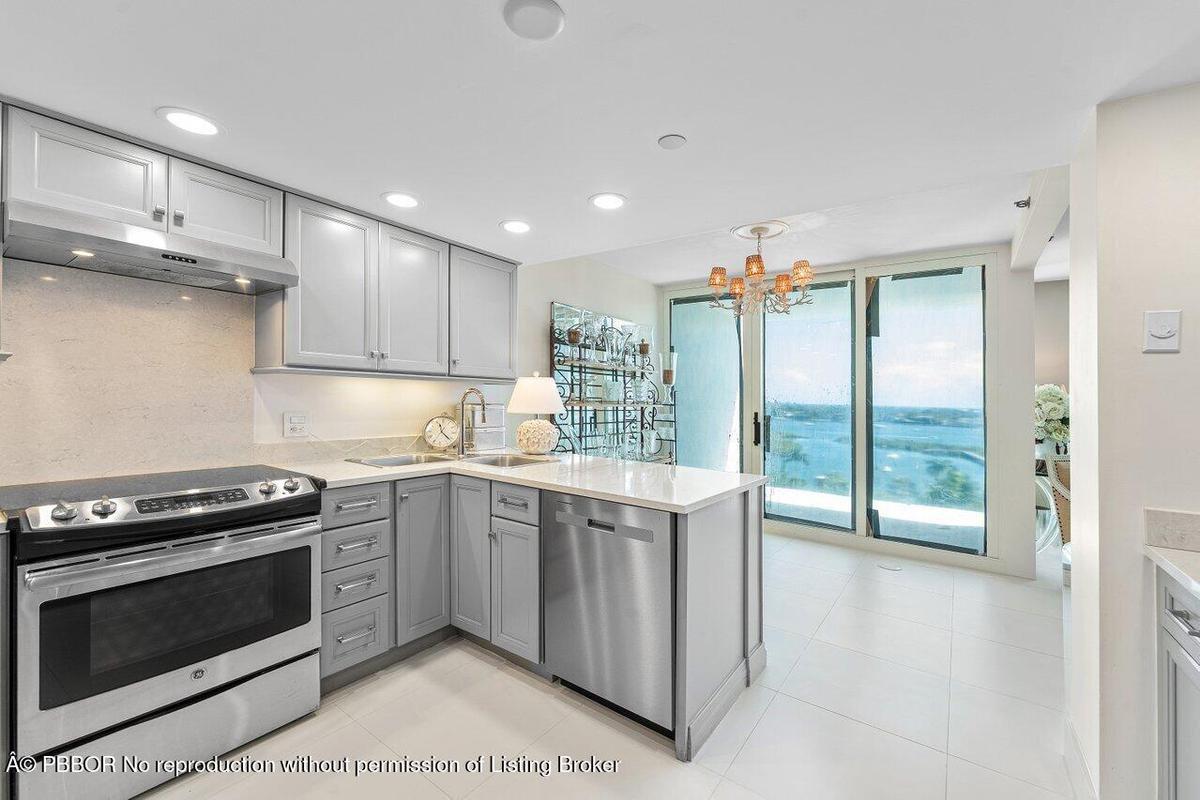 Kitchen Opens to Balcony Dining Area with Gorgeous Views