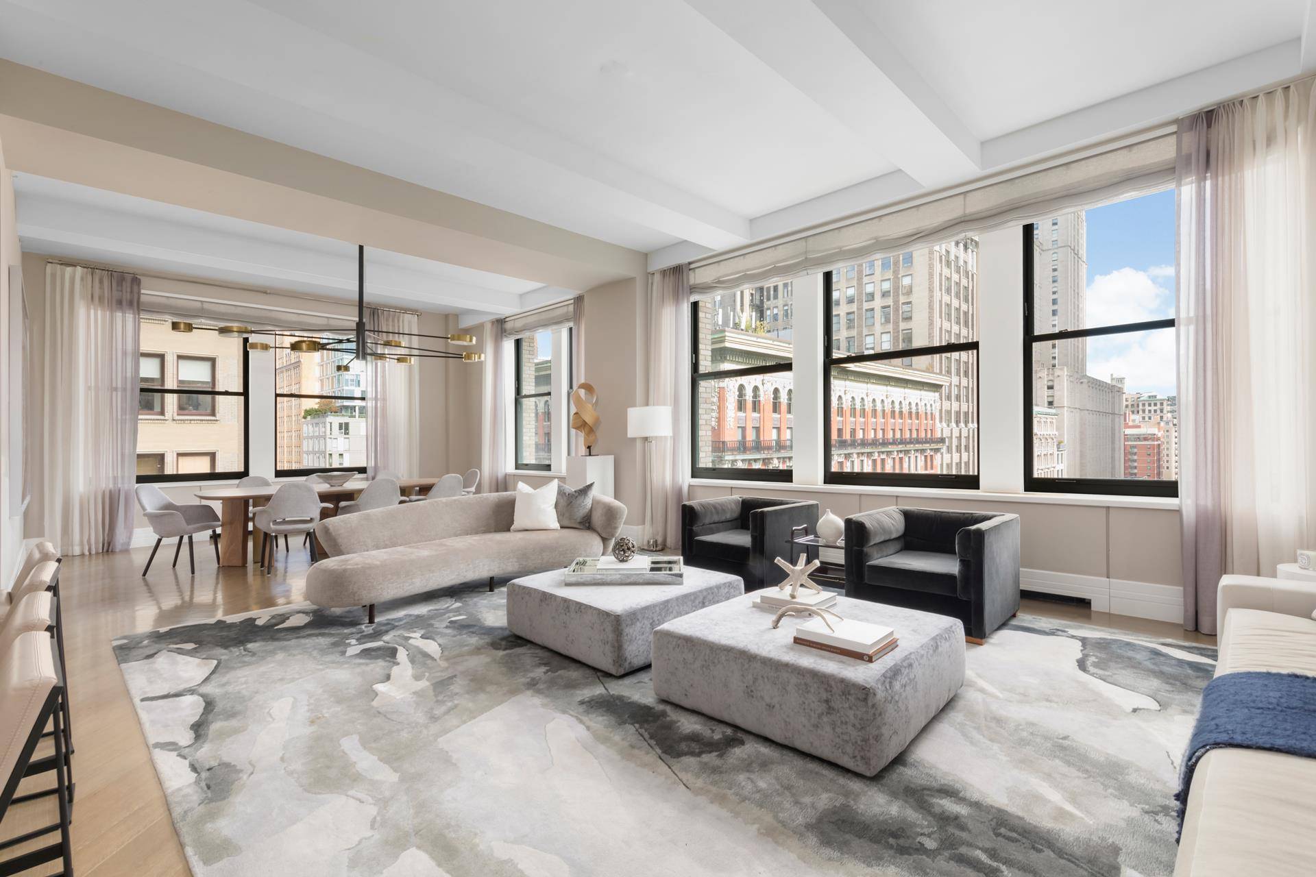 Perfectly located on the 11th floor and offering gorgeous views of Madison Square Park, this stunning 3 bedroom, 3.