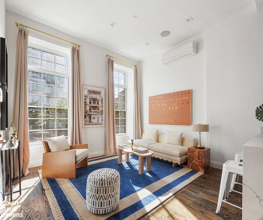 This charming parlor level two bedroom, two bathroom home offers the best of both worlds floor through brownstone living with thoughtful renovations made throughout.