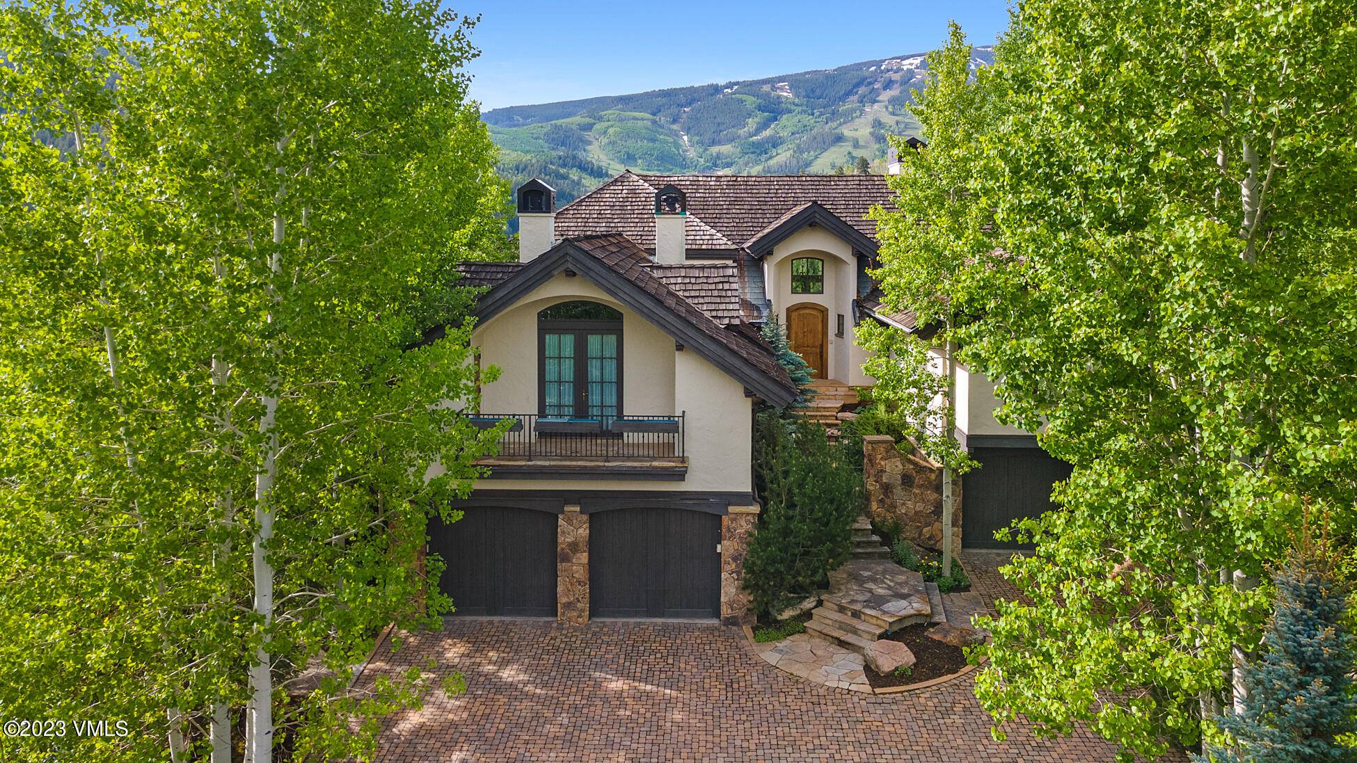 This stunning property boasts breathtaking views of the surrounding mountains and is situated in a prime location with easy access to world class skiing, hiking, and outdoor adventures.