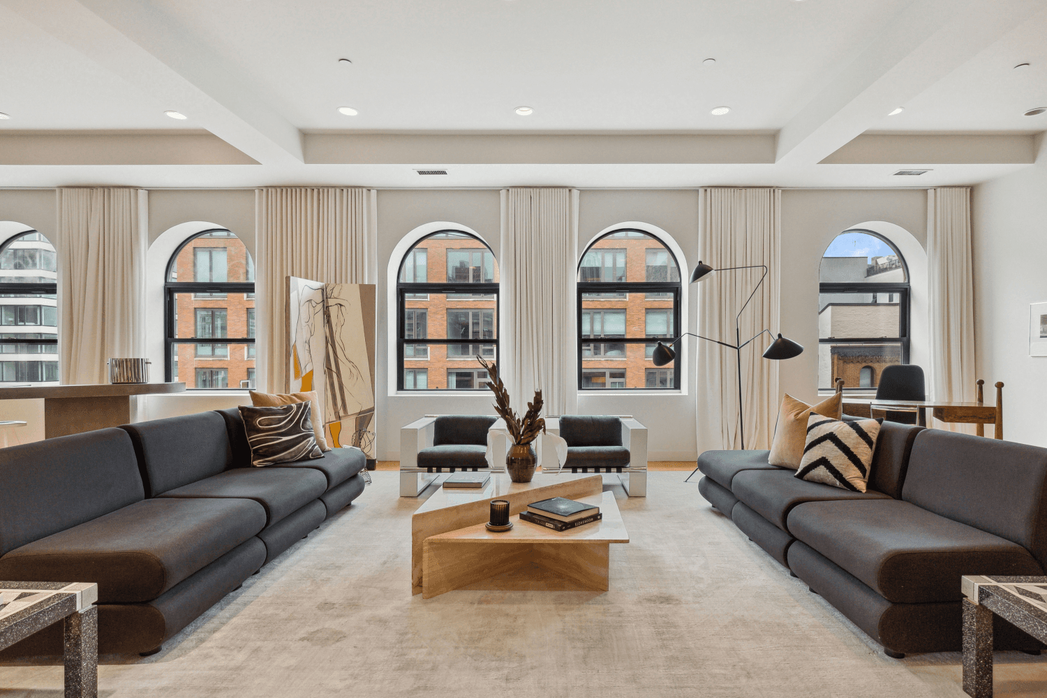 Chic sun drenched penthouse loft with fireplaces and private rooftop terrace !