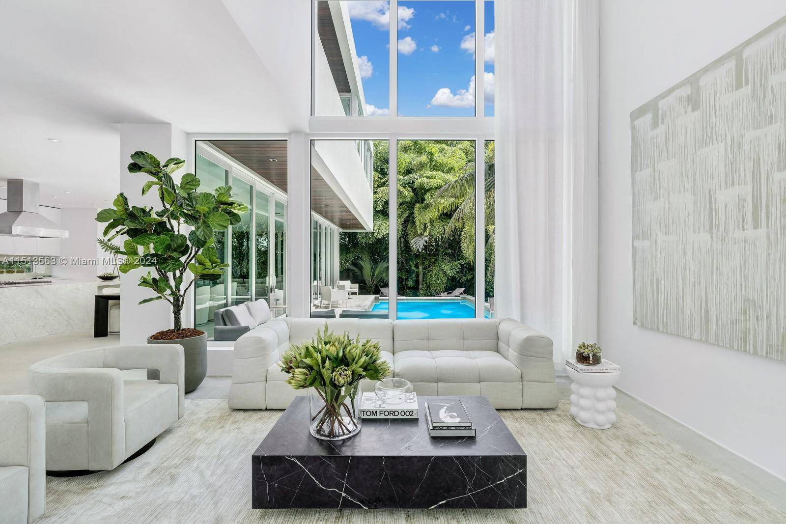 Step Inside With Me ! Embraced by walls of glass, this ultra contemporary residence by Todd Glaser with architecture by DOMO greets with 18' ceilings enviable natural light.