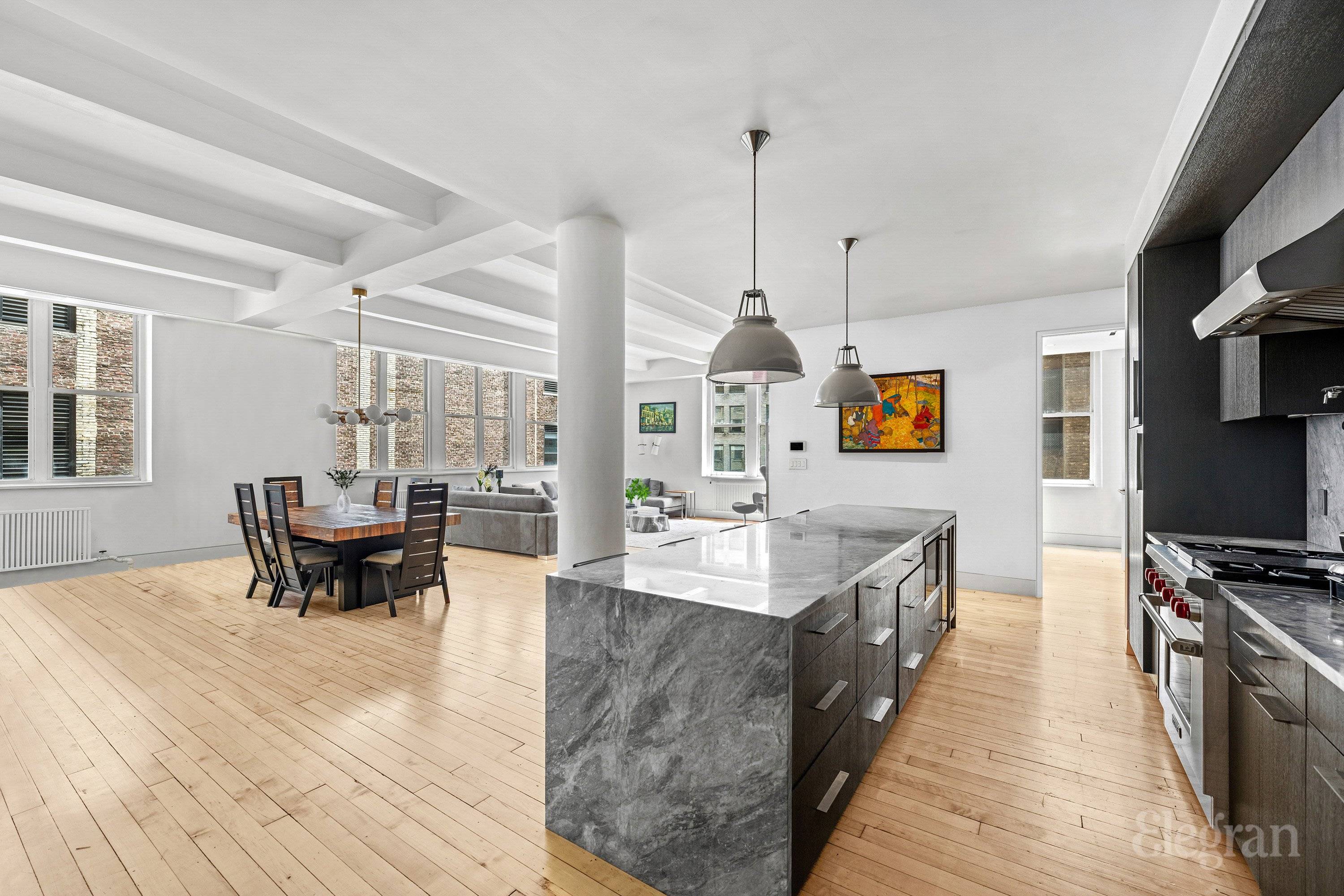 Welcome home to an unparalleled luxury loft in the heart of Flatiron !