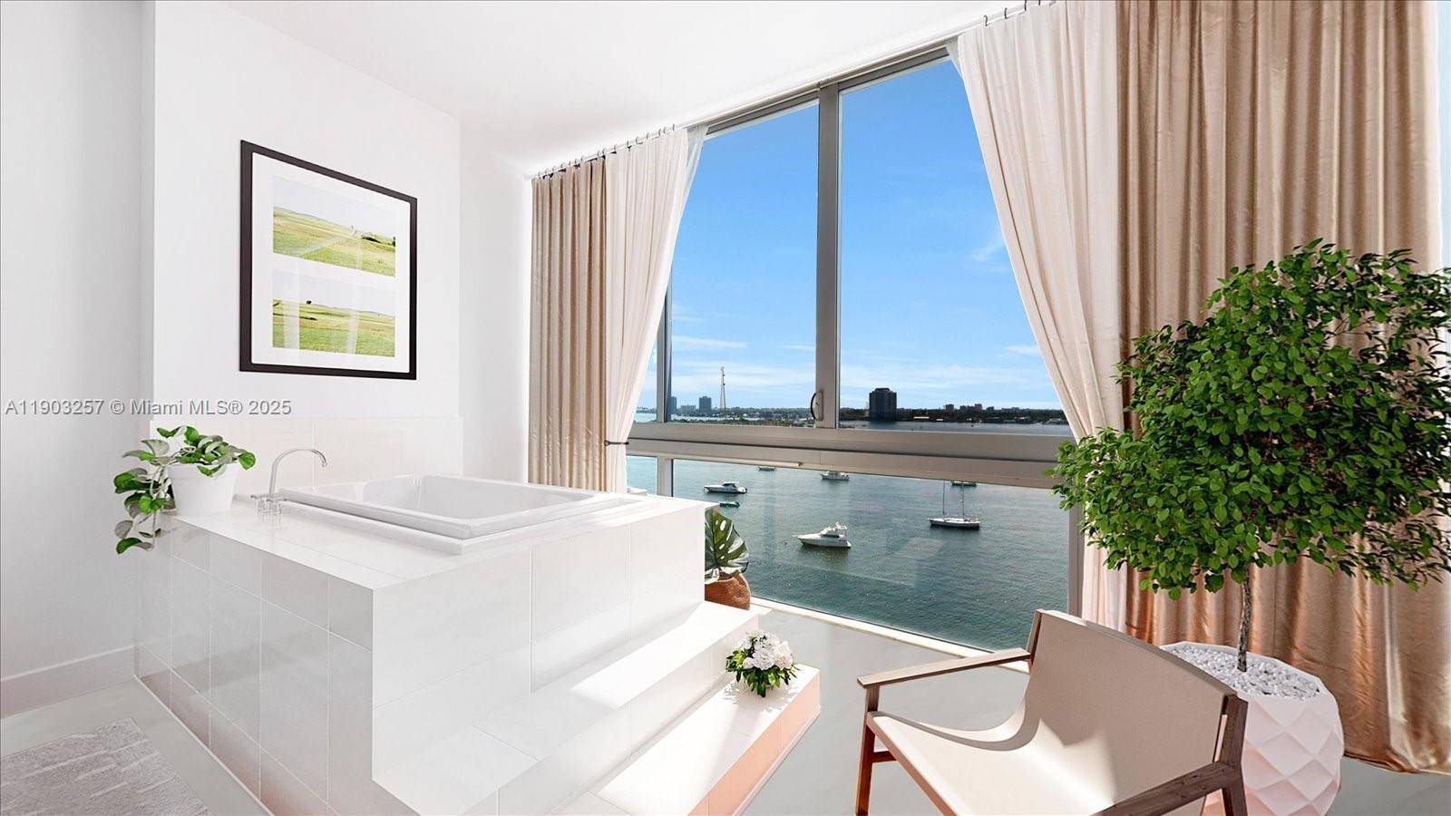 Luminous corner loft in an avant garde building overlooking the shimmering Biscayne Bay, framed by floor to ceiling windows that capture the full sunset.