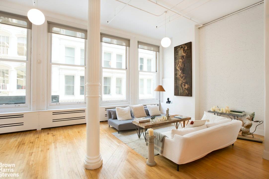 Beautifully renovated 3, 000SF loft in a classic 1882 cast iron building on the one of the most desirable blocks of the SoHo Gold Coast, Greene Street between Prince amp ...