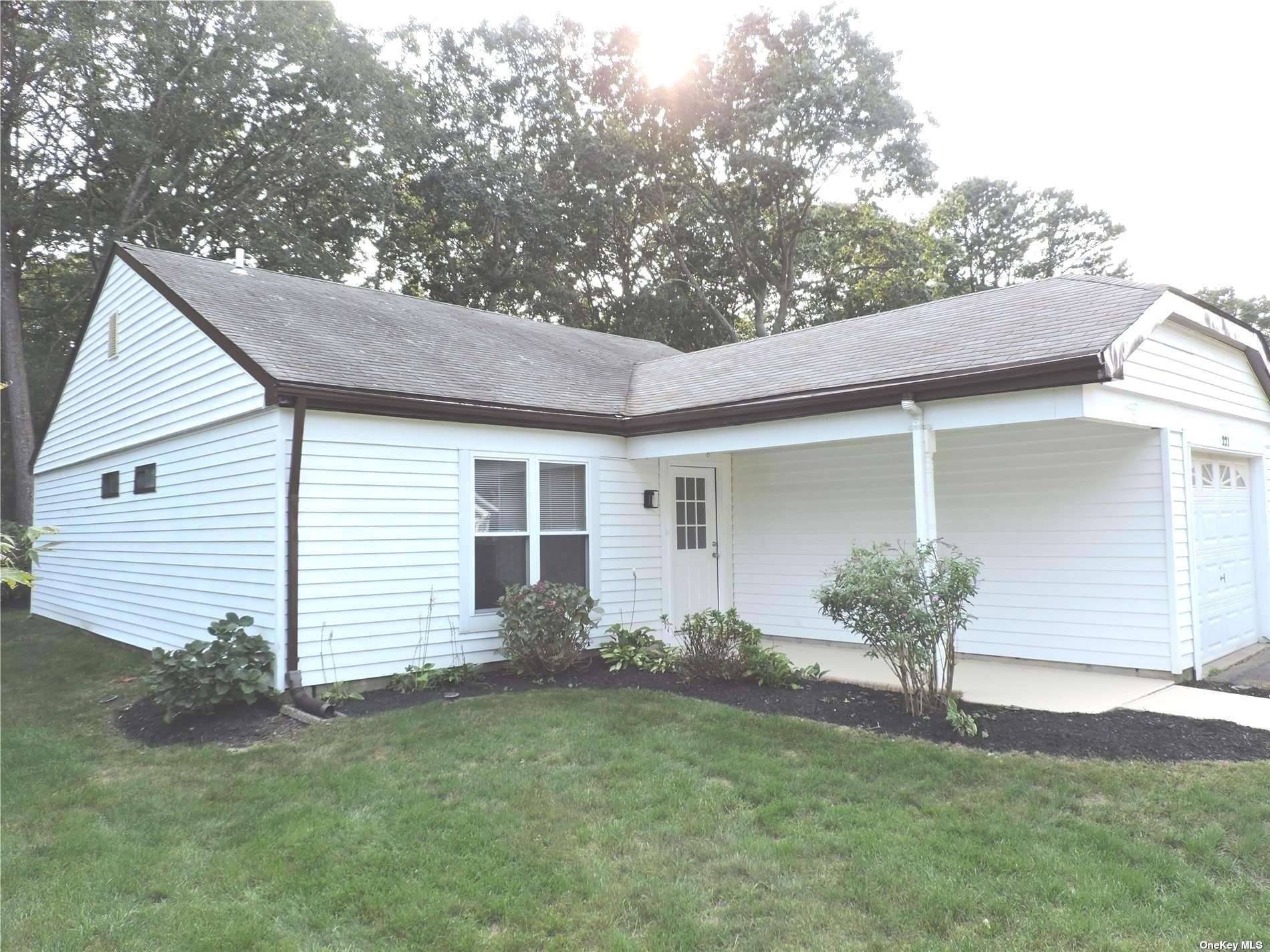 Beautifully renovated home in picture perfect location bordering wooded area.