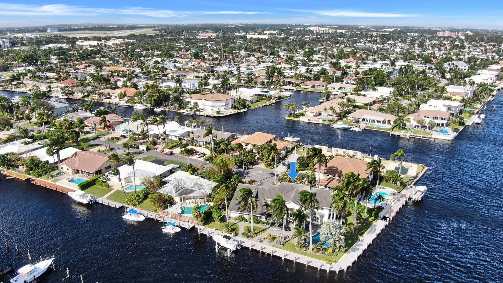 Commonly known by locals as ''The White House Of Pompano Beach'', this stunning corner lot is on the DIRECT INTRACOASTAL.