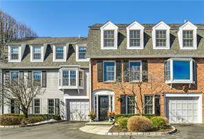 Stunning 3700 SF luxury townhouse with ELEVATOR, private bluestone terrace and attached garage in lovely Old Forge Green.