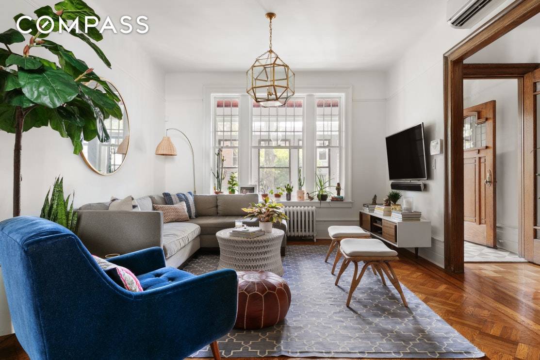 This gorgeous three level brick townhouse, located just two blocks south of Prospect Park, epitomizes classic neighborhood Brooklyn.