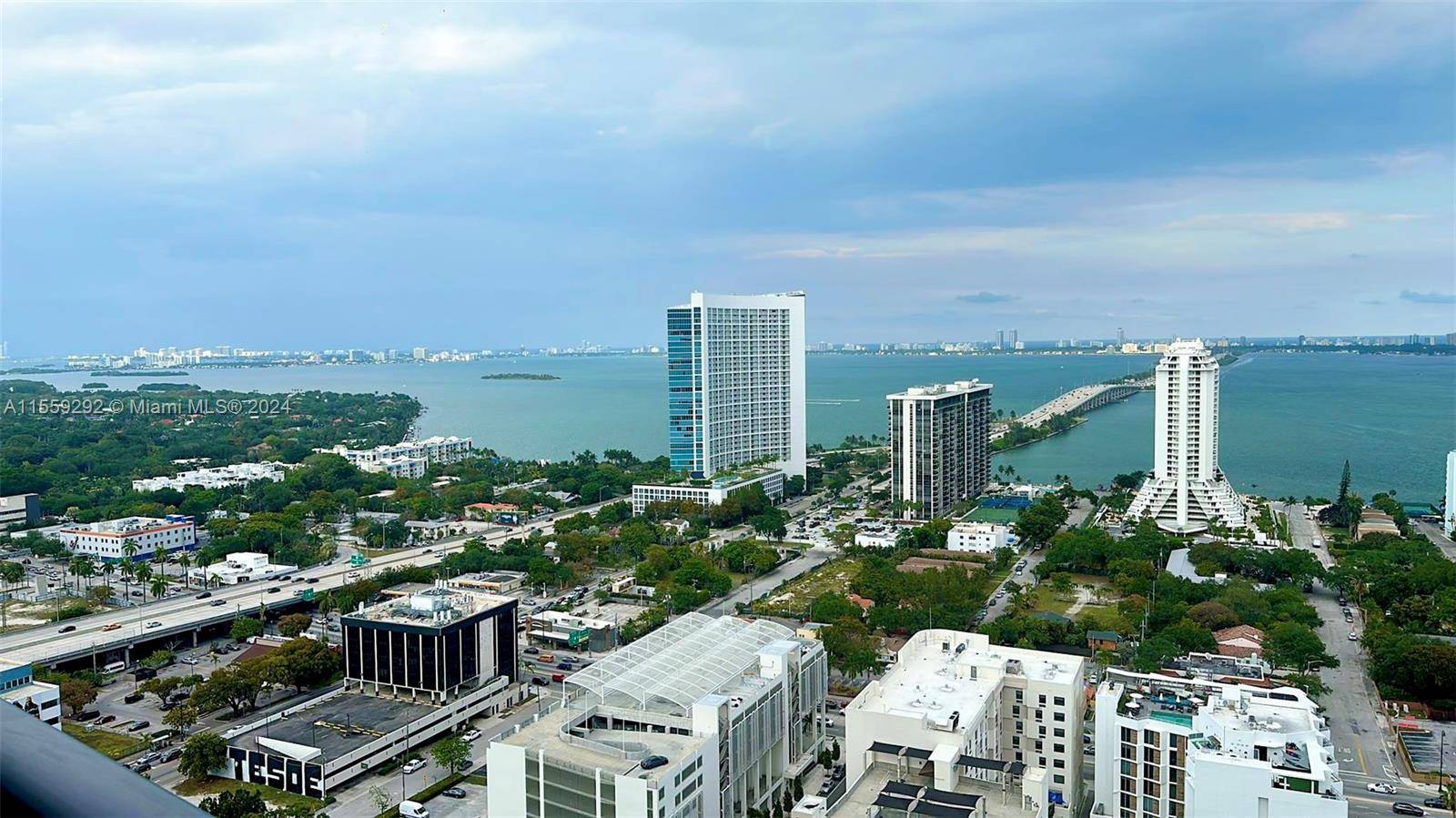 BREATHTAKING DIRECT BAY AND MIAMI SKYLINE VIEWS FROM THIS AMAZING FULLY FURNISHED 2 BEDROOM CONVERTED DEN, 2 FULL BATHS WITH THROUGHOUT CERAMIC WOOD LIKE FLOORS, KITCHEN W ITALIANCABINETRY, SS APPLIANCES ...