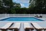 View of swimming pool with outdoor lounge area and a fenced in pool