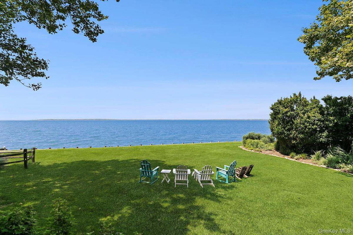 View of grassy yard featuring a water view