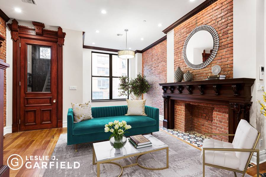 Upon entering 246 West 121st Street, one immediately feels the grandeur of the space and the quality and attention to detail present in the impeccable renovation of this Harlem Home.