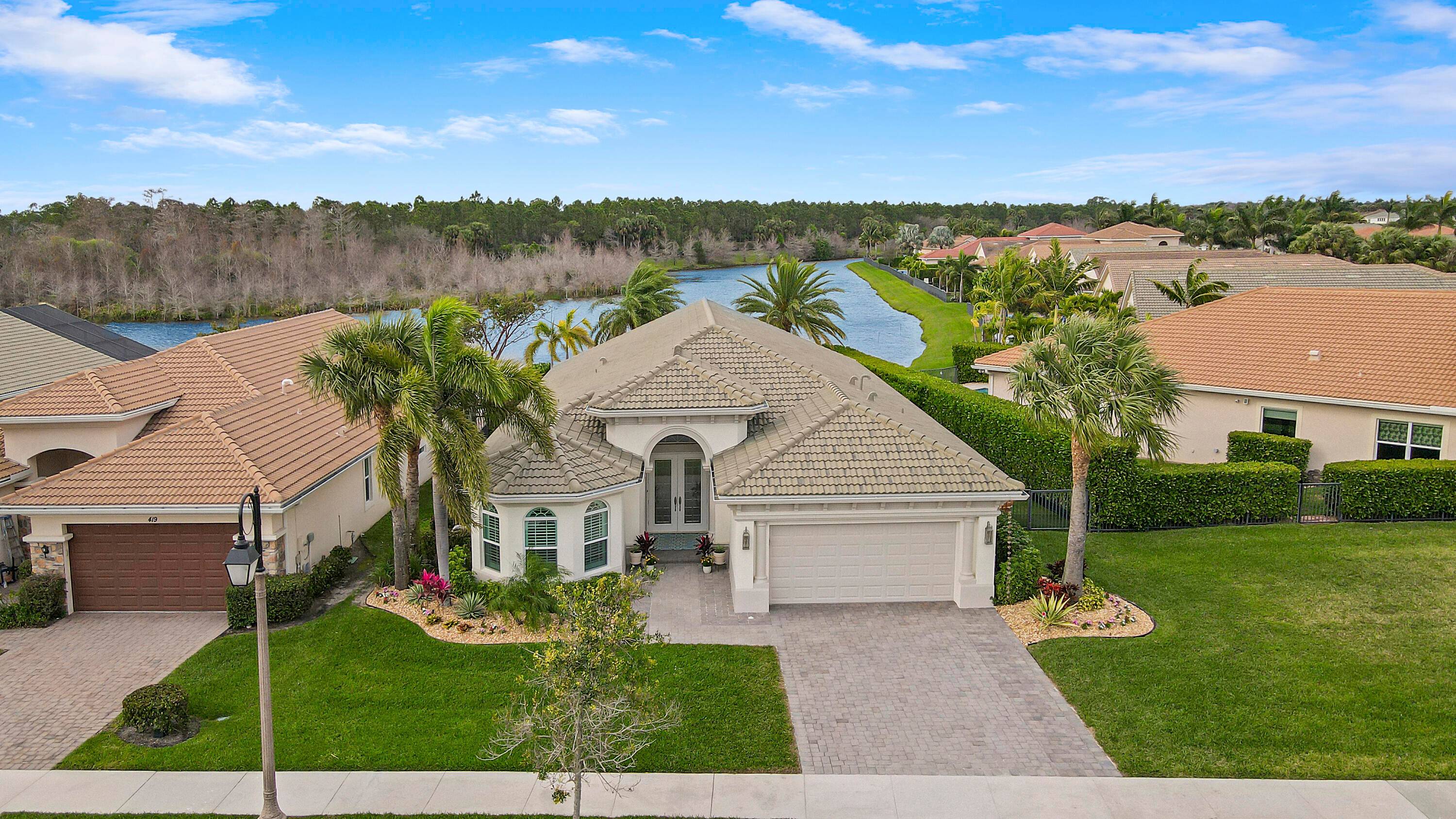 Welcome to your lakeside paradise in Jupiter Country Club.